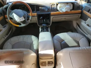 2001 Lincoln Continental with VIN 1LNHM97V61Y604213, listed as a Copart auction lot 52517535 with 112,391 mi miles and Salvage Title. Bid and sale history available at DreamBid. Image 8.