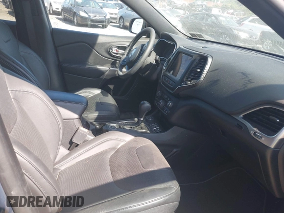 2021 Jeep Cherokee Latitude Lux z VIN 1C4PJMMX8MD205199, wystawiony jako IAAI lot #42556584 z przebiegiem 32 787 mil mil oraz . Historia ofert i sprzedaży dostępna na DreamBid. Obrazek 5.