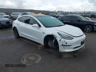 2019 Tesla Model 3 Mid Range z VIN 5YJ3E1EA7KF326498, wystawiony jako IAAI lot #42164899 z przebiegiem 126 274 mil mil oraz . Historia ofert i sprzedaży dostępna na DreamBid. Obrazek 1.