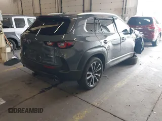 2024 Mazda CX-50 S Premium Plus z VIN 7MMVABEM7RN194987, wystawiony jako IAAI lot #42267229 z przebiegiem 10 039 mil mil oraz . Historia ofert i sprzedaży dostępna na DreamBid. Obrazek 4.