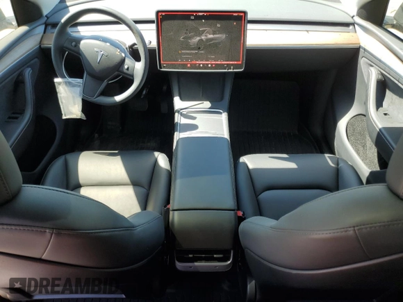 2023 Tesla Model Y Long Range z VIN 7SAYGDEE8PA185193, wystawiony jako Copart lot #48706215 z przebiegiem 10 451 mil mil oraz Szkoda całkowita • Salvage title. Historia ofert i sprzedaży dostępna na DreamBid. Obrazek 8.