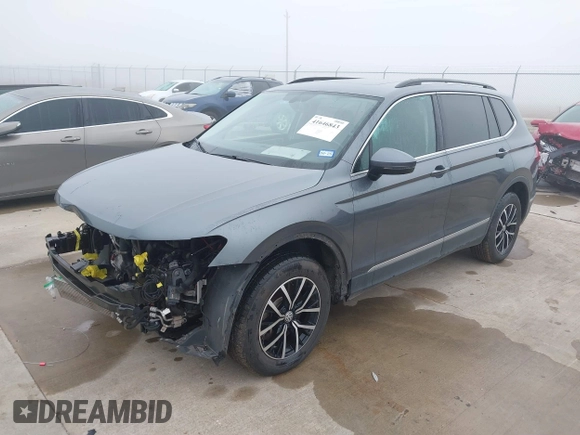 2021 Volkswagen Tiguan SE with VIN 3VV2B7AX8MM143189, listed as a IAAI auction lot 41646843 with 56,672 mi miles and . Bid and sale history available at DreamBid. Image 17.
