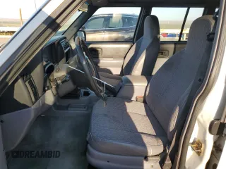 1997 Jeep Cherokee Sport with VIN 1J4FT68S9VL547391, listed as a Copart auction lot 70447484 with 250,171 mi miles and Salvage Title. Bid and sale history available at carsss.com. Image 7.