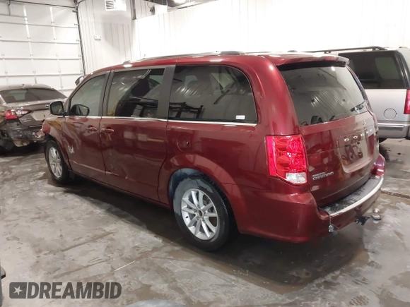 2019 Dodge Grand Caravan SXT with VIN 2C4RDGCG9KR678235, listed as a IAAI auction lot 41864931 with 127,848 mi miles and . Bid and sale history available at DreamBid. Image 3.