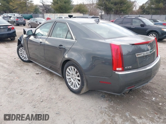 2012 Cadillac CTS Luxury z VIN 1G6DE5E51C0112608, wystawiony jako IAAI lot #41656992 z przebiegiem Nie podano mil oraz . Historia ofert i sprzedaży dostępna na DreamBid. Obrazek 3.