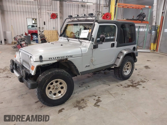 2003 Jeep Wrangler Rubicon with VIN 1J4FA69S13P375142, listed as a IAAI auction lot 41709647 with 125,443 mi miles and . Bid and sale history available at DreamBid. Image 2.