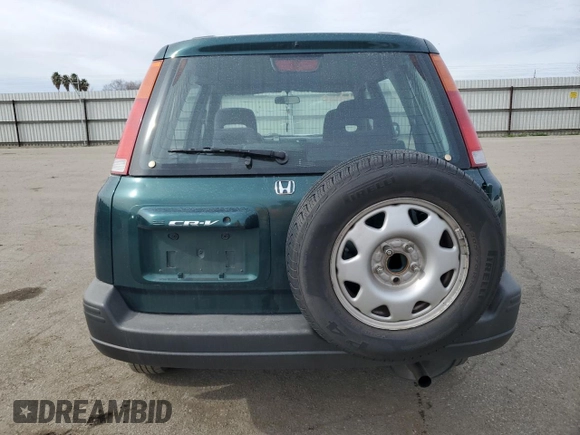 1999 Honda CR-V LX with VIN JHLRD2844XC010900, listed as a Copart auction lot 44024355 with 114,011 mi miles and Salvage Title. Bid and sale history available at carsss.com. Image 6.