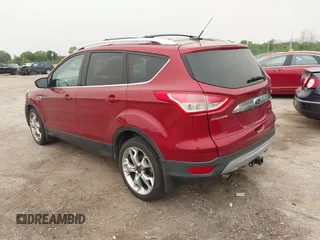 2015 Ford Escape Titanium with VIN 1FMCU9J96FUC02177, listed as a IAAI auction lot 42312928 with 100,716 mi miles and . Bid and sale history available at DreamBid. Image 3.