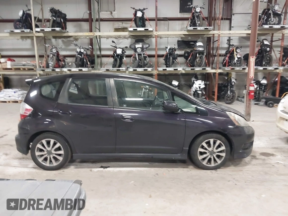 2013 Honda Fit Sport z VIN JHMGE8H56DC019556, wystawiony jako IAAI lot #41140755 z przebiegiem Nie podano mil oraz . Historia ofert i sprzedaży dostępna na DreamBid. Obrazek 12.