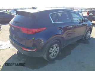 2019 Kia Sportage LX with VIN KNDPM3AC4K7534271, listed as a IAAI auction lot 41696261 with 71,386 mi miles. Bid and sale history available at carsss.com. Image 4.