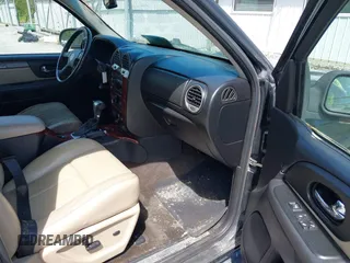 2007 GMC Envoy SLE with VIN 1GKDT13S372103718, listed as a IAAI auction lot 41886111 with 238,423 mi miles. Bid and sale history available at carsss.com. Image 5.