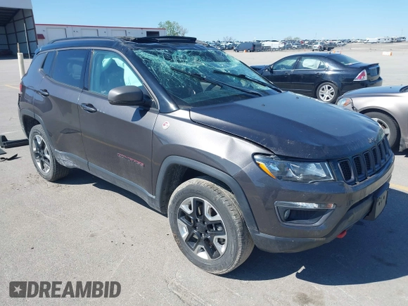2019 Jeep Compass Trailhawk with VIN 3C4NJDDB0KT619337, listed as a IAAI auction lot 42171160 with 63,869 mi miles and . Bid and sale history available at DreamBid. Image 1.