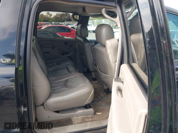 2004 Chevrolet Suburban LT with VIN 3GNEC16T74G283784, listed as a IAAI auction lot 42397880 with 201,870 mi miles and . Bid and sale history available at DreamBid. Image 8.