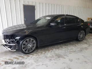 2017 BMW 5 Series 530i xDrive with VIN WBAJA7C32HG906764, listed as a Copart auction lot 70457944 with 103,043 mi miles and Salvage title. Bid and sale history available at DreamBid. Image 1.