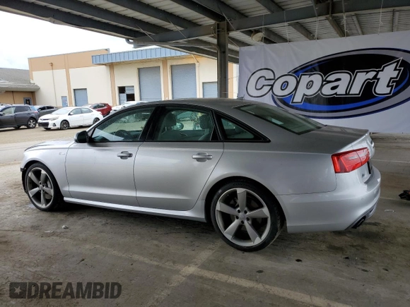 2014 Audi A6 Prestige z VIN WAUHGAFC1EN143102, wystawiony jako Copart lot #53692145 z przebiegiem 101 503 mil mil oraz Szkoda całkowita • Salvage title. Historia ofert i sprzedaży dostępna na DreamBid. Obrazek 2.