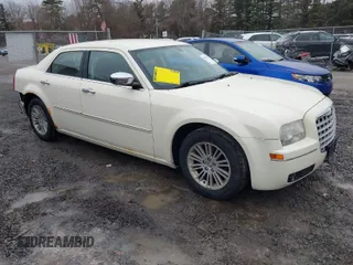 2010 Chrysler 300 Touring with VIN 2C3CA5CV2AH105249, listed as a IAAI auction lot 41710257 with 126,405 mi miles. Bid and sale history available at carsss.com. Image 1.