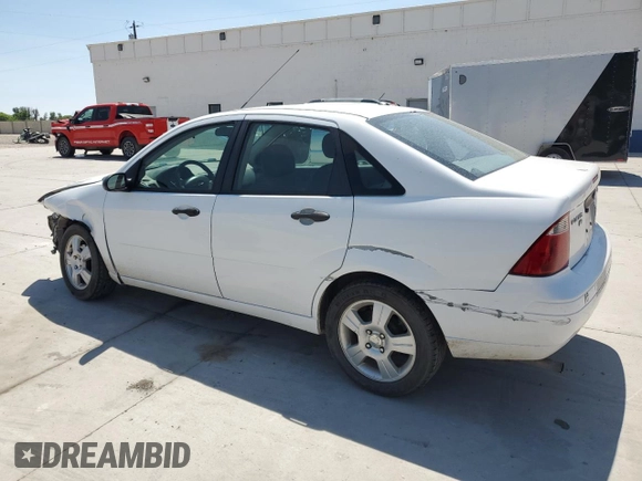 2005 Ford Focus S with VIN 1FAFP34N05W296550, listed as a Copart auction lot 59391835 with 216,509 mi miles and Salvage title. Bid and sale history available at DreamBid. Image 2.