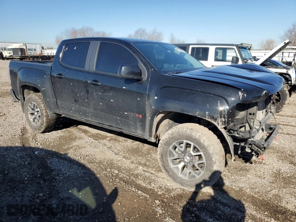2021 GMC Canyon 4WD AT4 w/Leather with VIN 1GTG6FEN3M1274409, listed as a Copart auction lot 42502355 with 57,194 mi miles and Salvage Title. Bid and sale history available at carsss.com. Image 4.