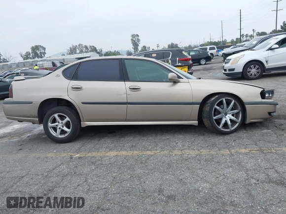 2003 Chevrolet Impala LS with VIN 2G1WH52K239353096, listed as a IAAI auction lot 41890556 with 149,065 mi miles and . Bid and sale history available at DreamBid. Image 13.