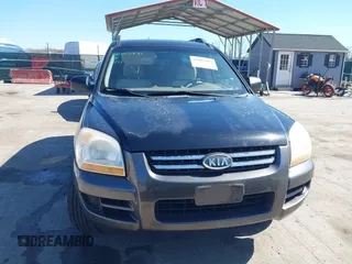 2007 Kia Sportage LX with VIN KNDJF724877313178, listed as a IAAI auction lot 41863492 with 199,138 mi miles. Bid and sale history available at carsss.com. Image 12.