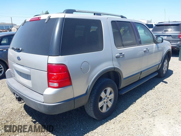 2003 Ford Explorer XLT with VIN 1FMZU73K13ZA43498, listed as a IAAI auction lot 42596053 with 199,668 mi miles and . Bid and sale history available at DreamBid. Image 4.