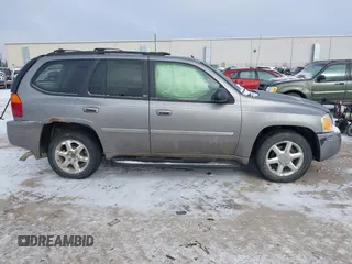 2007 GMC Envoy SLE with VIN 1GKDT13S072246688, listed as a IAAI auction lot 41258265 with 218,001 mi miles. Bid and sale history available at carsss.com. Image 13.