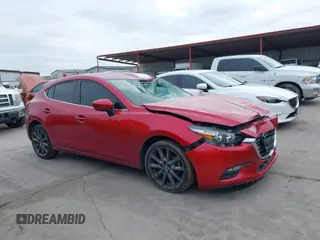 2018 Mazda 3 Touring with VIN 3MZBN1L37JM167604, listed as a IAAI auction lot 41623232 with 118,974 mi miles. Bid and sale history available at carsss.com. Image 14.