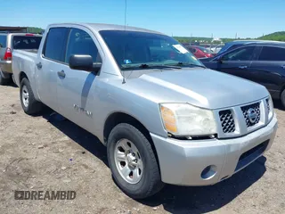 2007 Nissan Titan XE with VIN 1N6AA07AX7N231823, listed as a IAAI auction lot 42300587 with 210,735 mi miles and . Bid and sale history available at DreamBid. Image 1.