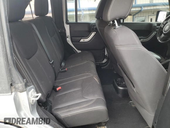 2014 Jeep Wrangler Unlimited Rubicon with VIN 1C4BJWFG7EL197252, listed as a Copart auction lot 44798205 with 115,778 mi miles and Salvage Title. Bid and sale history available at carsss.com. Image 10.