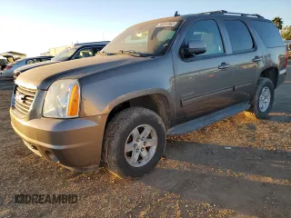 2013 GMC Yukon SLE with VIN 1GKS1AE05DR313734, listed as a Copart auction lot 39047363 with 97,303 mi miles and Salvage Title. Bid and sale history available at carsss.com. Image 1.