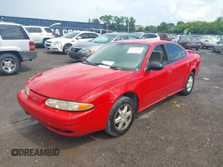 2003 Oldsmobile Alero GL1 z VIN 1G3NL52F43C211667, wystawiony jako IAAI lot #42249590 z przebiegiem Nie podano mil oraz . Historia ofert i sprzedaży dostępna na DreamBid. Obrazek 2.