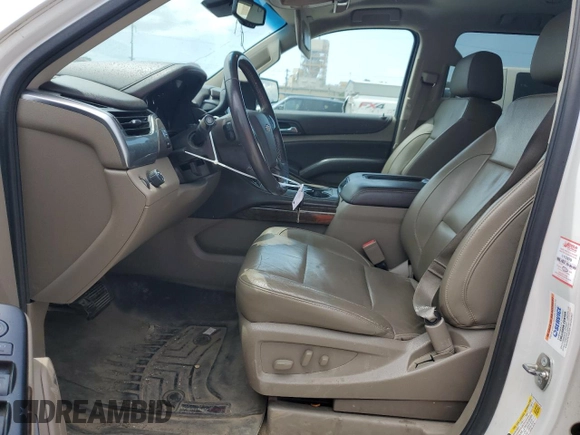 2016 Chevrolet Tahoe LT with VIN 1GNSCBKC5GR418148, listed as a Copart auction lot 60049615 with 211,105 mi miles and Salvage title. Bid and sale history available at DreamBid. Image 7.