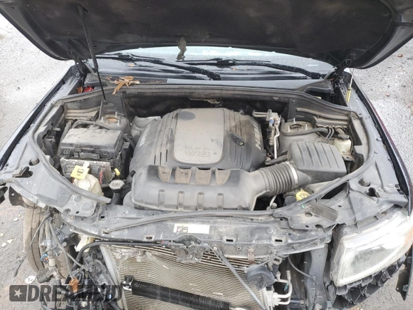 2014 Jeep Grand Cherokee Limited with VIN 1C4RJEBT5EC147459, listed as a Copart auction lot 87828735 with 213,960 mi miles and Clean Title. Bid and sale history available at DreamBid. Image 12.