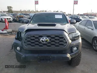 2021 Toyota Tacoma 4WD SR5 with VIN 3TMDZ5BN2MM108586, listed as a IAAI auction lot 41604953 with 65,422 mi miles. Bid and sale history available at carsss.com. Image 12.