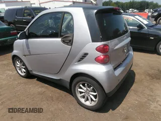 2008 Smart fortwo Pure with VIN WMEEJ31X88K162198, listed as a IAAI auction lot 42809814 with 75,630 mi miles and . Bid and sale history available at DreamBid. Image 3.