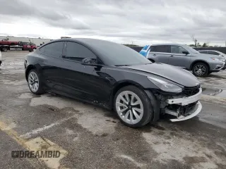 2022 Tesla Model 3 with VIN 5YJ3E1EA0NF186296, listed as a Copart auction lot 45711405 with 75,653 mi miles and Salvage Title. Bid and sale history available at DreamBid. Image 4.