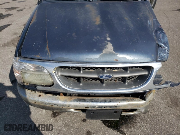 1998 Ford Explorer XLT с VIN 1FMZU32P3WZB05199, выставлен на аукционе Copart как лот 79951194 с пробегом 209 673 миль миль и Списание • Salvage title. История ставок и продаж доступна на DreamBid. Изображение 12.