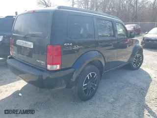 2010 Dodge Nitro SXT with VIN 1D4PU5GK0AW134368, listed as a IAAI auction lot 41786095 with 117,563 mi miles. Bid and sale history available at carsss.com. Image 4.