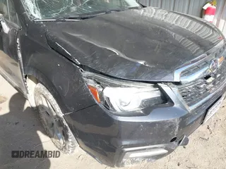 2017 Subaru Forester Touring with VIN JF2SJAWC6HH466379, listed as a IAAI auction lot 42031728 with 140,020 mi miles and . Bid and sale history available at DreamBid. Image 6.