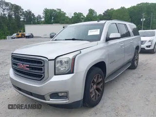 2015 GMC Yukon XL SLT with VIN 1GKS1HKC2FR251672, listed as a IAAI auction lot 42152312 with 232,736 mi miles and . Bid and sale history available at carsss.com. Image 17.