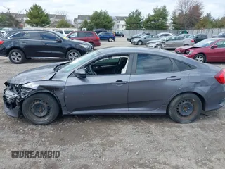 2016 Honda Civic Sedan LX with VIN 19XFC2F57GE250093, listed as a IAAI auction lot 41897786 with 106,966 mi miles. Bid and sale history available at carsss.com. Image 14.