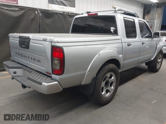 2001 Nissan Frontier z VIN 1N6MD27T01C384859, wystawiony jako IAAI lot #42058030 z przebiegiem 90 415 mil mil oraz . Historia ofert i sprzedaży dostępna na DreamBid. Obrazek 4.