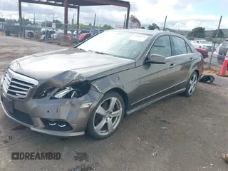 2010 Mercedes-Benz E with VIN WDDHF5GB2AA115447, listed as a IAAI auction lot 42068721 with 133,081 mi miles. Bid and sale history available at carsss.com. Image 2.