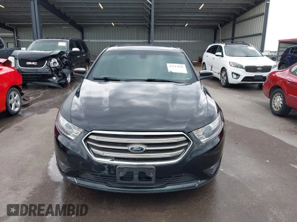 2015 Ford Taurus SEL with VIN 1FAHP2H85FG108575, listed as a IAAI auction lot 42514846 with 209,478 mi miles and . Bid and sale history available at DreamBid. Image 12.