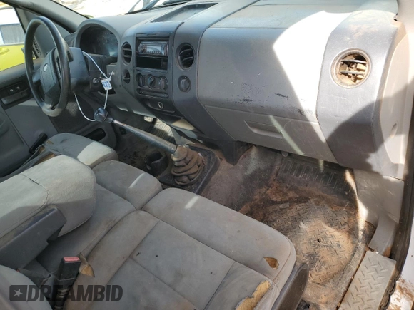 2007 Ford F-150 XL with VIN 1FTRF12287KC42057, listed as a Copart auction lot 85299854 with 2,060,155 mi miles and Salvage title. Bid and sale history available at DreamBid. Image 8.