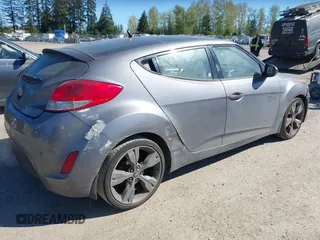 2013 Hyundai Veloster w/Black Int with VIN KMHTC6AD8DU103122, listed as a IAAI auction lot 42068175 with 123,512 mi miles. Bid and sale history available at carsss.com. Image 4.