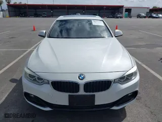 2016 BMW 4 Series 428i with VIN WBA4A9C51GGL88011, listed as a IAAI auction lot 41852057 with 117,669 mi miles. Bid and sale history available at carsss.com. Image 12.