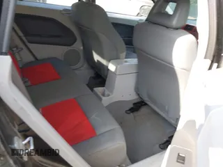 2007 Dodge Caliber SXT with VIN 1B3HB48B57D159305, listed as a IAAI auction lot 42095938 with 120,684 mi miles and . Bid and sale history available at DreamBid. Image 8.