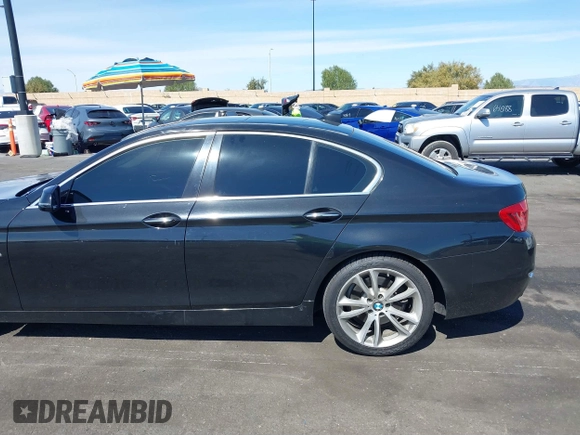 2014 BMW 5 Series 535i with VIN WBA5B1C54ED917047, listed as a IAAI auction lot 41727855 with 105,460 mi miles and . Bid and sale history available at DreamBid. Image 14.