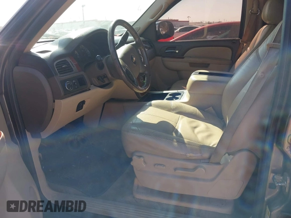 2011 Chevrolet Suburban LT with VIN 1GNSCJE03BR381301, listed as a IAAI auction lot 41412636 with 243,601 mi miles. Bid and sale history available at carsss.com. Image 5.
